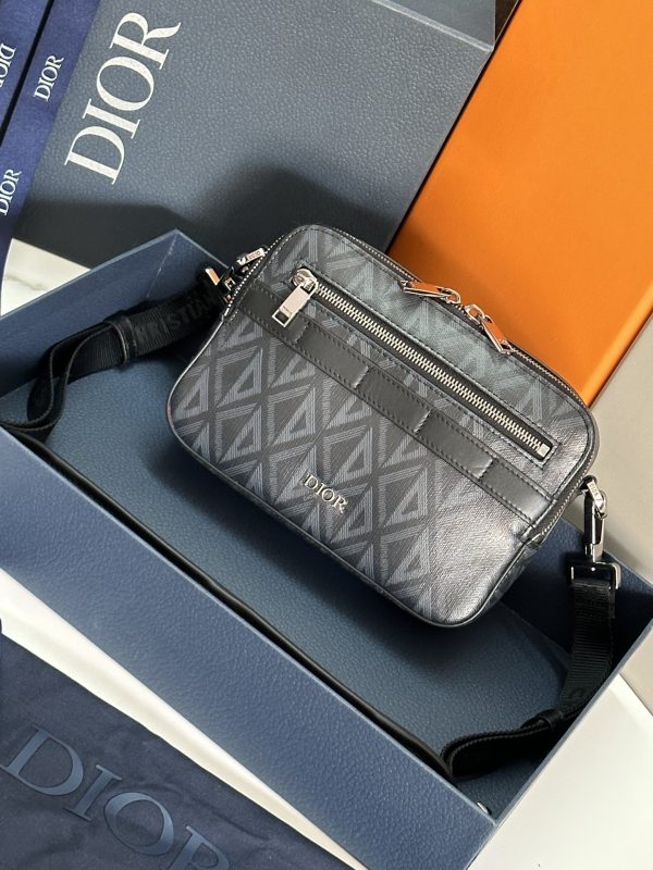 The CD Diamond pattern designed by Marc Bohan in 1974 reinterprets the CD initials with a three-dimensional diamond pattern, presented on canvas fabric