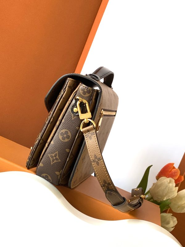 i1702360833_4410_1 Pochette M é tis handbag