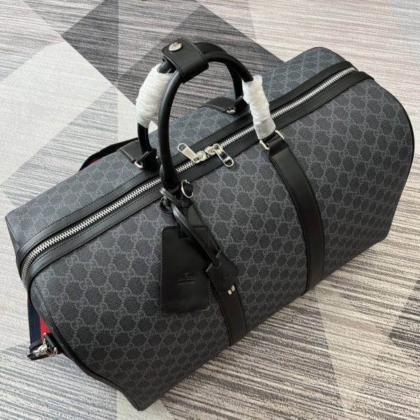 New GG travel bag. Classic GG Supreme canvas is known for its soft and stretchy texture