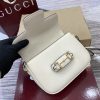 The Gucci Horsebit shoulder bag reproduces the brand's equestrian style design, incorporating light gold details and smooth soft leather