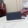 Interlocking double G and stirrup prints embellish various small leather items, showcasing festive colors. This pattern is eye-catching and embellished on this fully zippered wallet made of soft GG Supreme