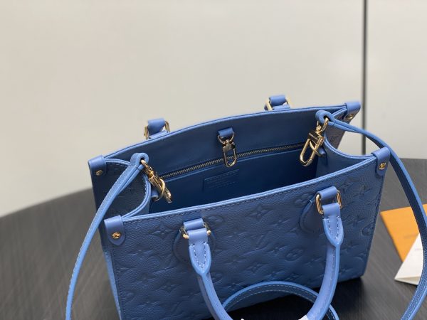 The OnTheGo small handbag is made of Monogram Empreinte sn leather